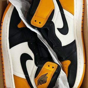 'Yellow Toe' colorway of the Air Jordan 1 Retro High OG also known as 'Taxi'